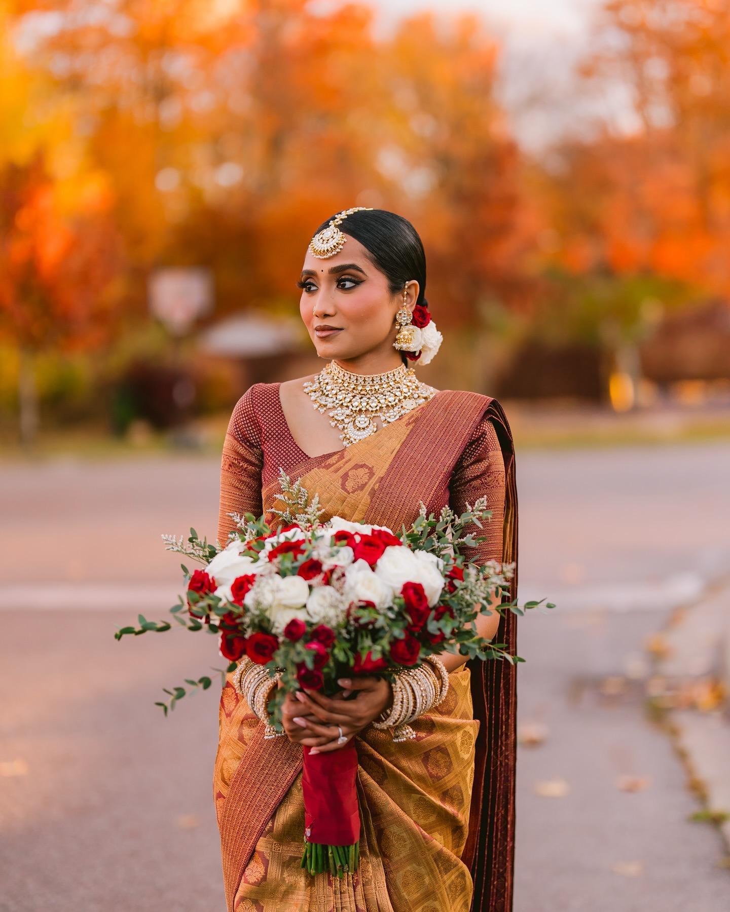 Gold kundan haath phool on a hand with bridal mehndi
